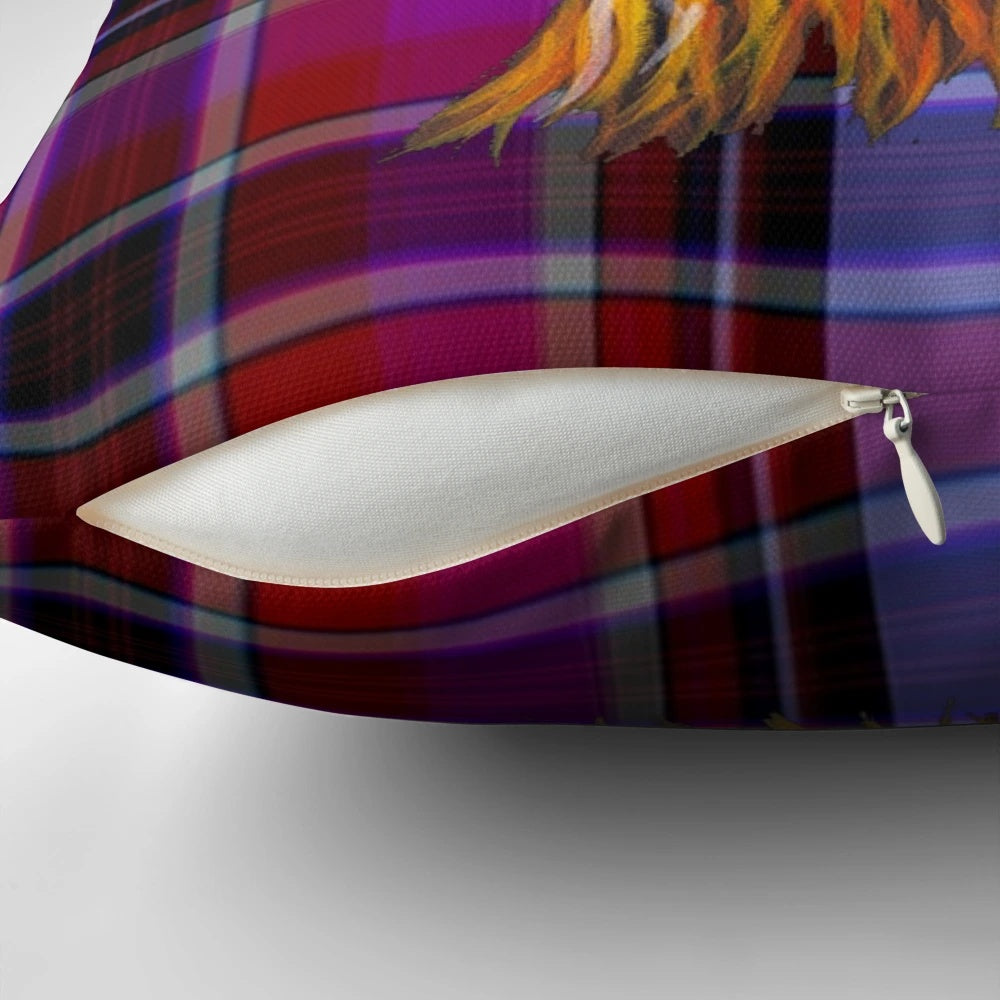 A soft, plush pillow featuring a highland cow in a tartan pattern with a galaxy-inspired background.