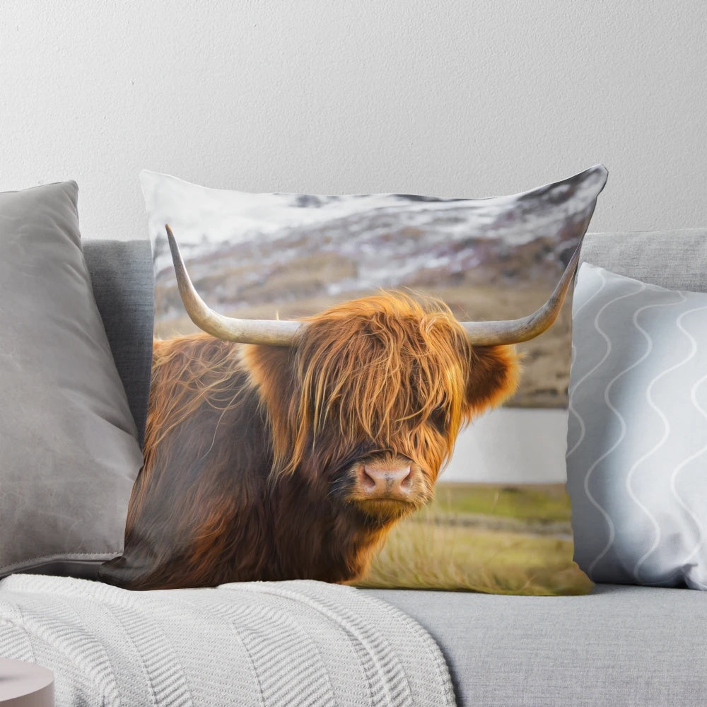A soft, plush throw pillow featuring the charming face of a Scottish Highland cow, perfect for adding a touch of rustic style to your home.