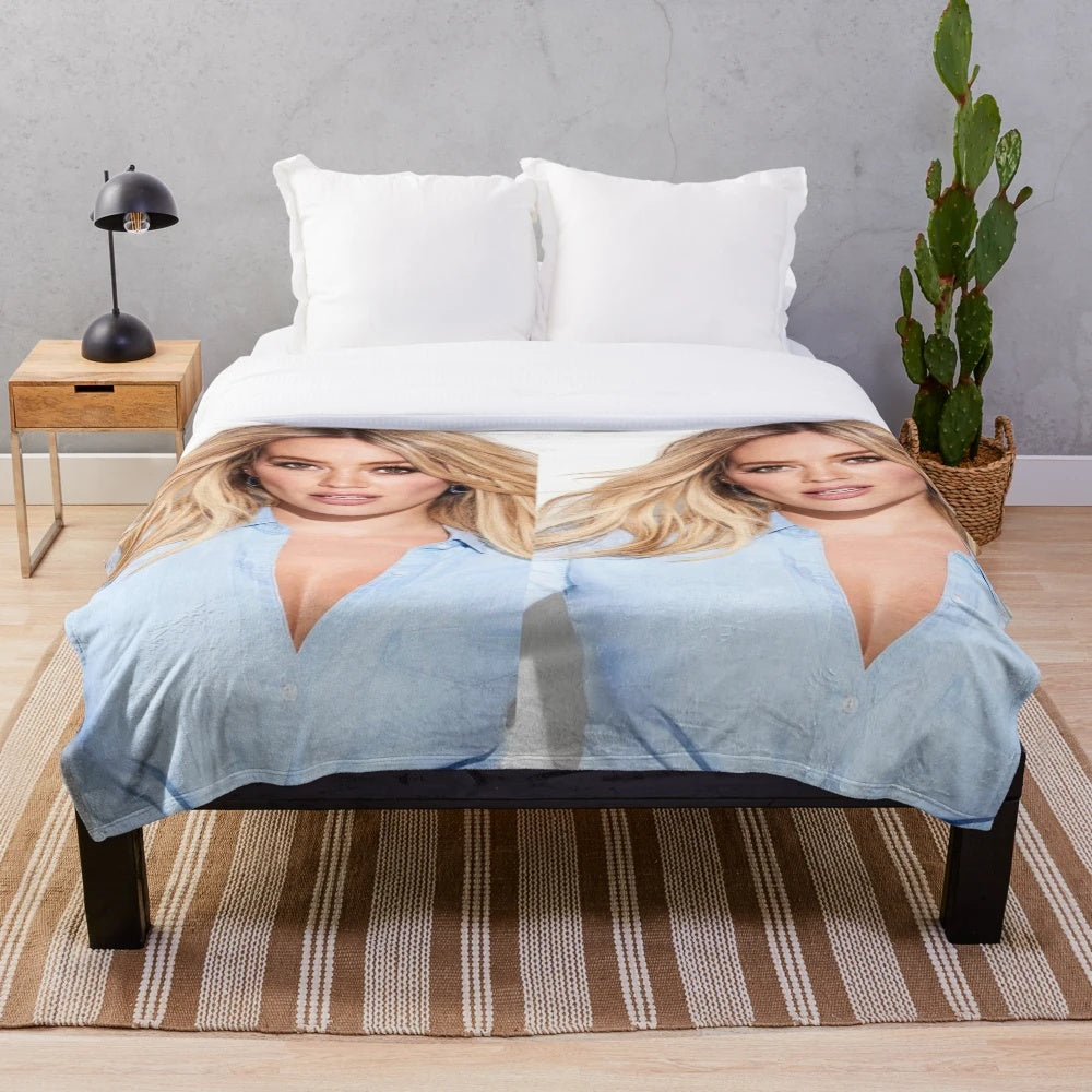 Soft and cuddly plush blanket featuring Hilary Duff, popular singer and actress