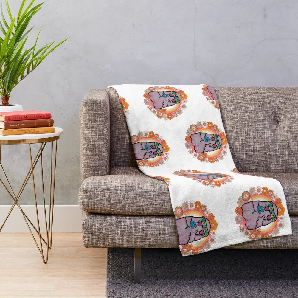 Cozy plush blanket with a hippie ghost design for fall and Halloween decor