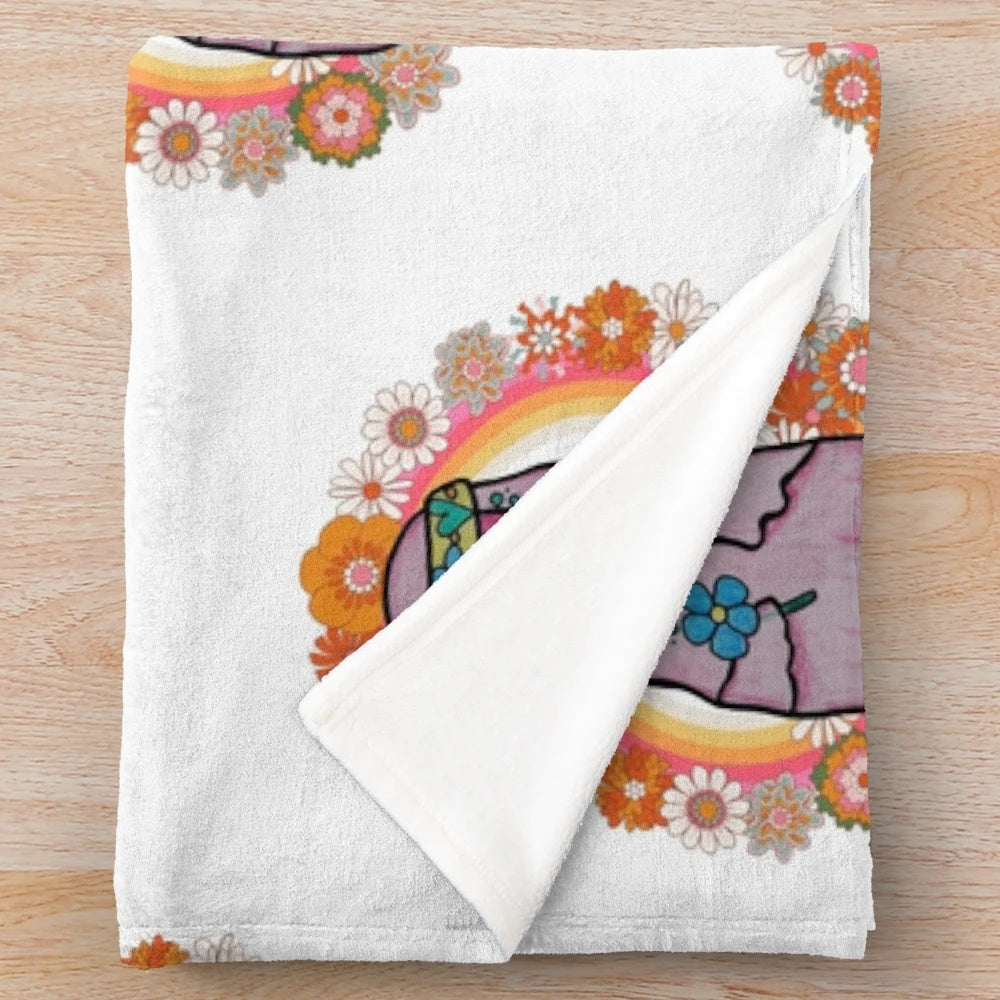 Cozy plush blanket with a hippie ghost design for fall and Halloween decor