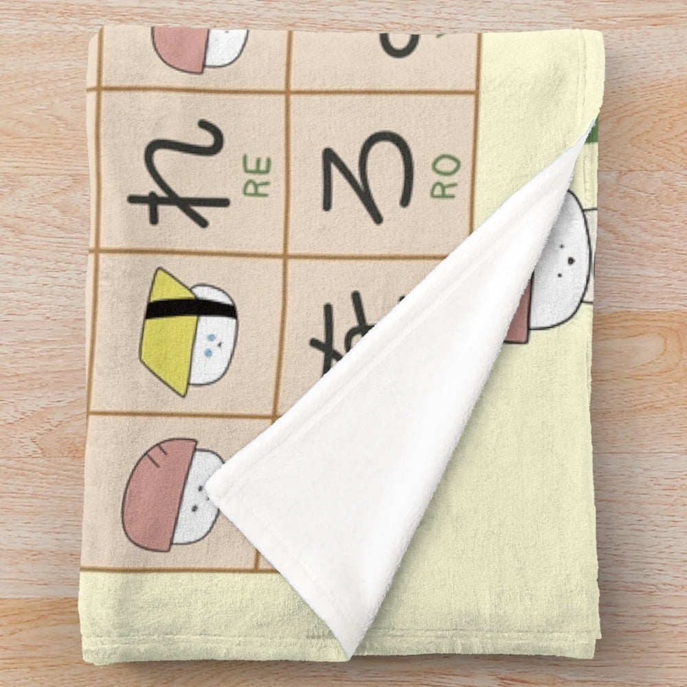 Soft and plush blanket featuring a hiragana cheat sheet design, perfect for Japanese language learners and anime/manga fans