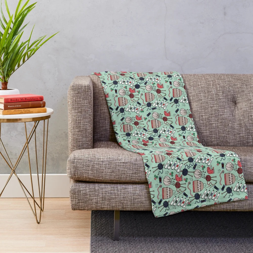 Colorful plush blanket featuring hobbies and crafting motifs