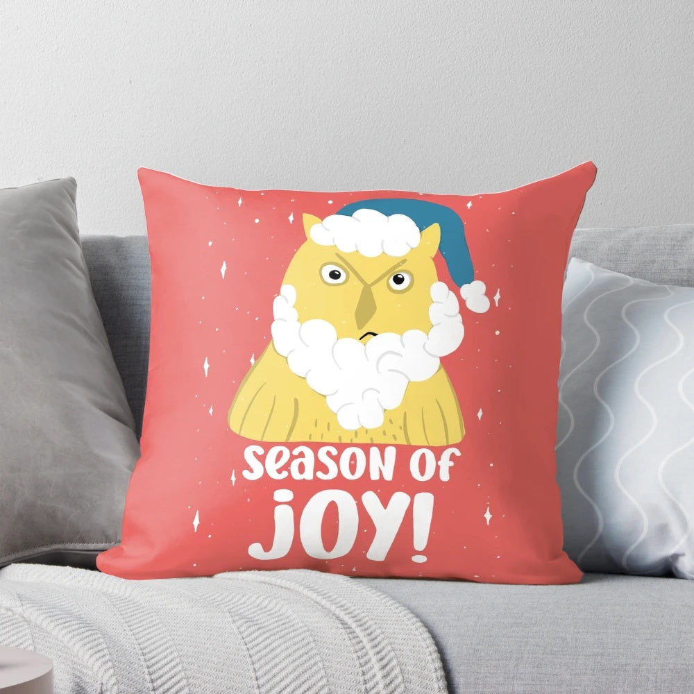 A decorative throw pillow featuring a grumpy-looking Santa owl on a winter-themed background.