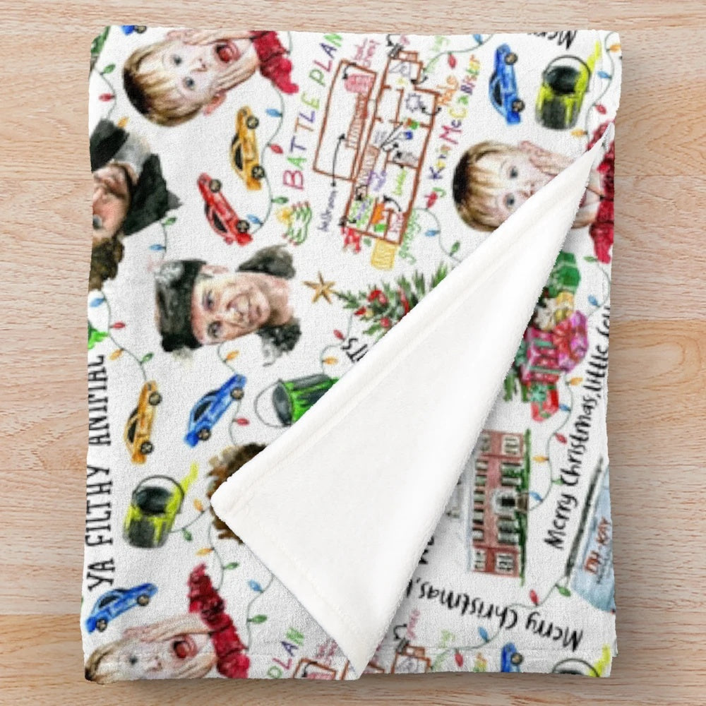 Plush blanket with Christmas movie-inspired pattern featuring Kevin McCallister from Home Alone