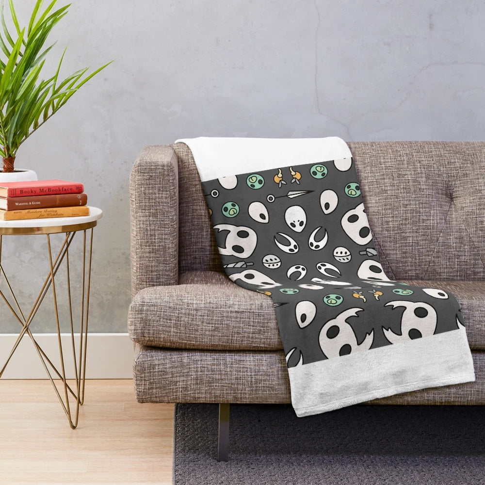 Hollow Knight 10" plush blanket featuring the iconic knight and ghost characters