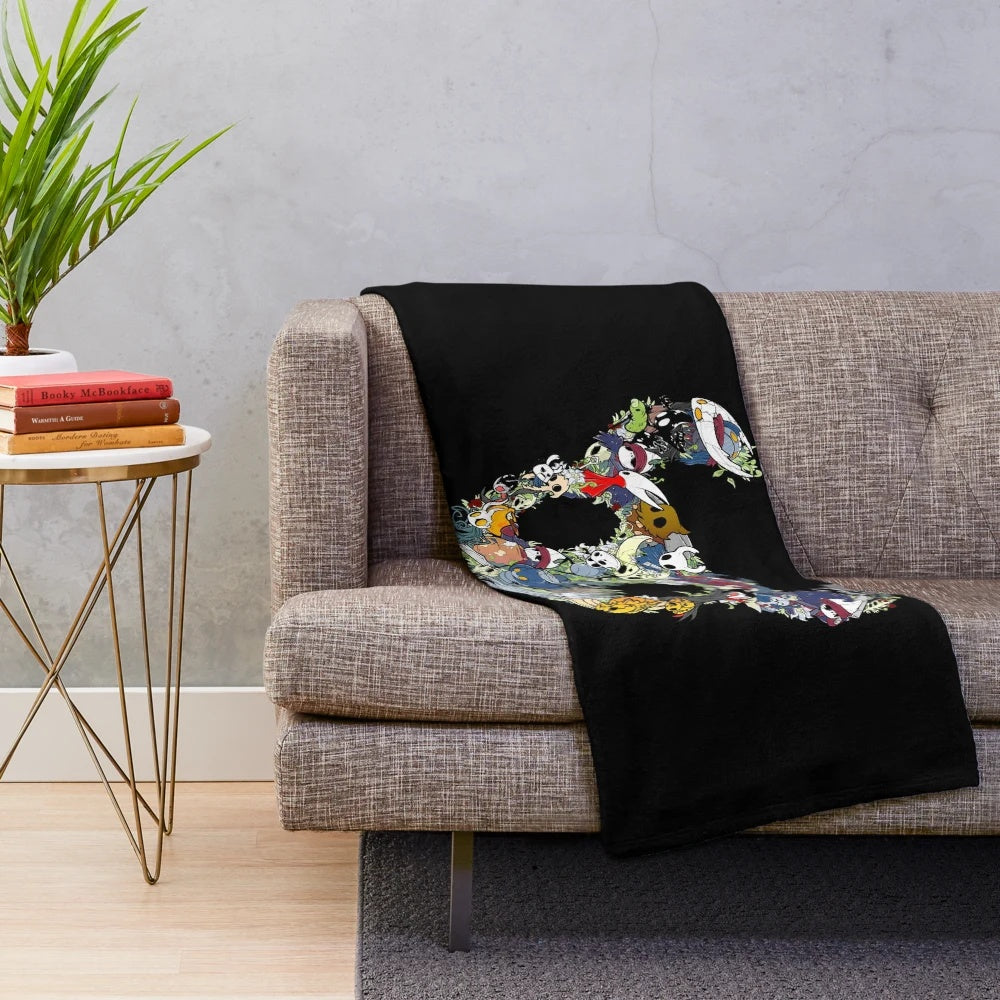 Hollow Knight-themed plush blanket with character designs