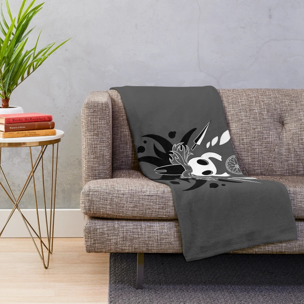 Soft and plush blanket featuring the hero of Dirtmouth from the video game Hollow Knight