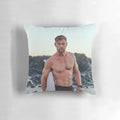 Photograph of a plush pillow featuring the image of famous Hollywood actor Chris Hemsworth