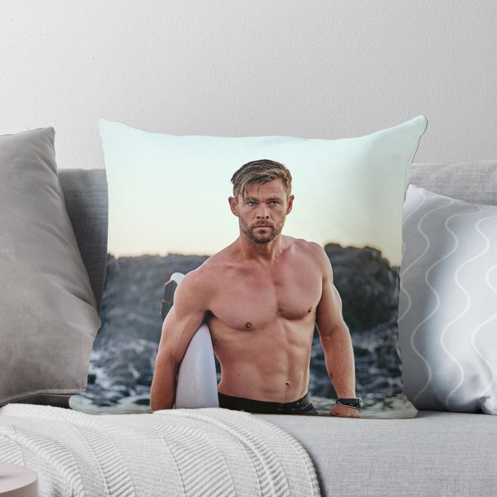 Photograph of a plush pillow featuring the image of famous Hollywood actor Chris Hemsworth
