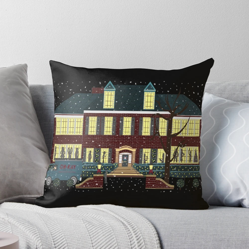 Pillow featuring the iconic home from the movie Home Alone with shadows dancing in the snowy window