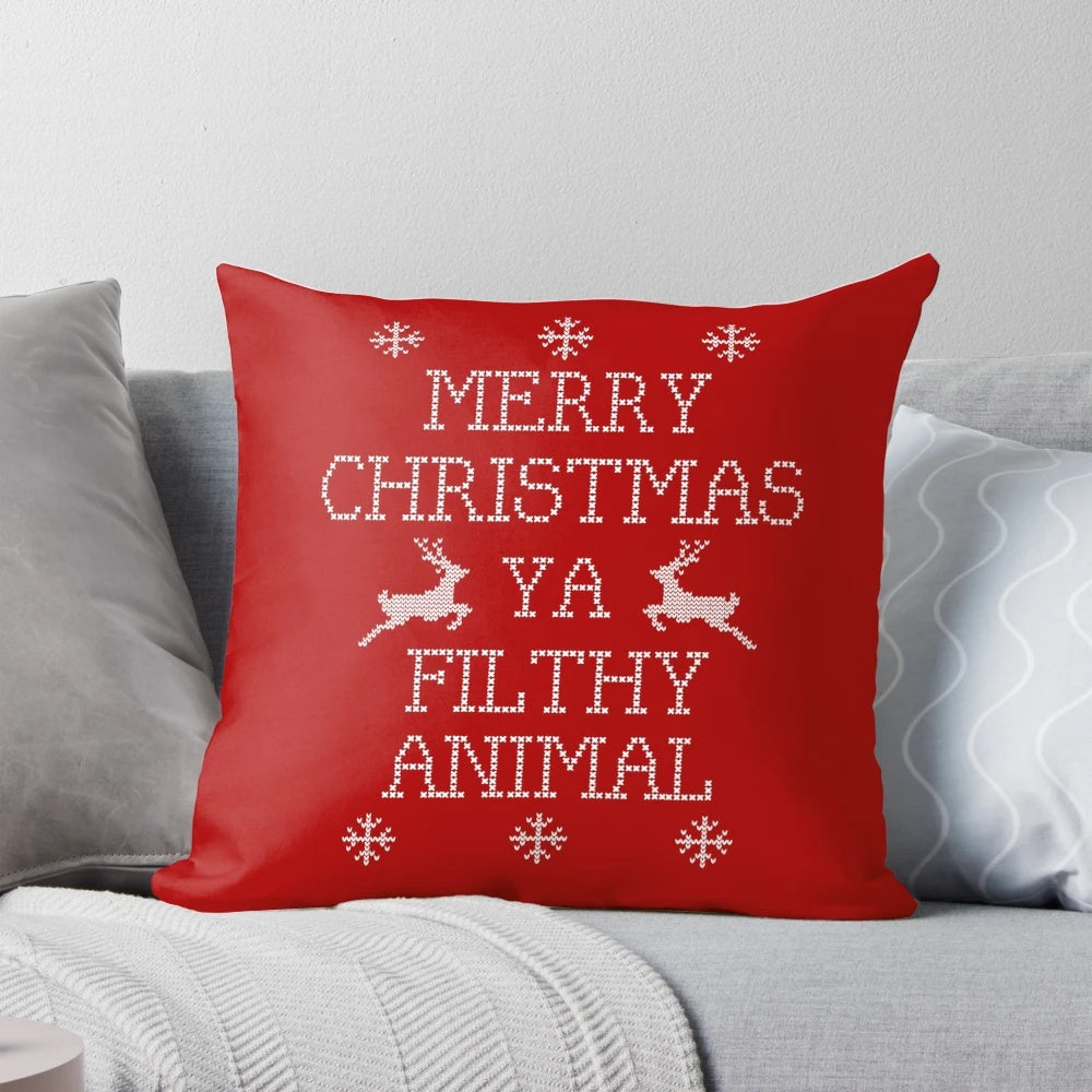 Soft, plush pillow featuring the iconic "Home Alone" quote "Merry Christmas Ya Filthy Animal