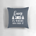 Home Is Where You Park It" throw pillow with camping, RV, and wanderlust design