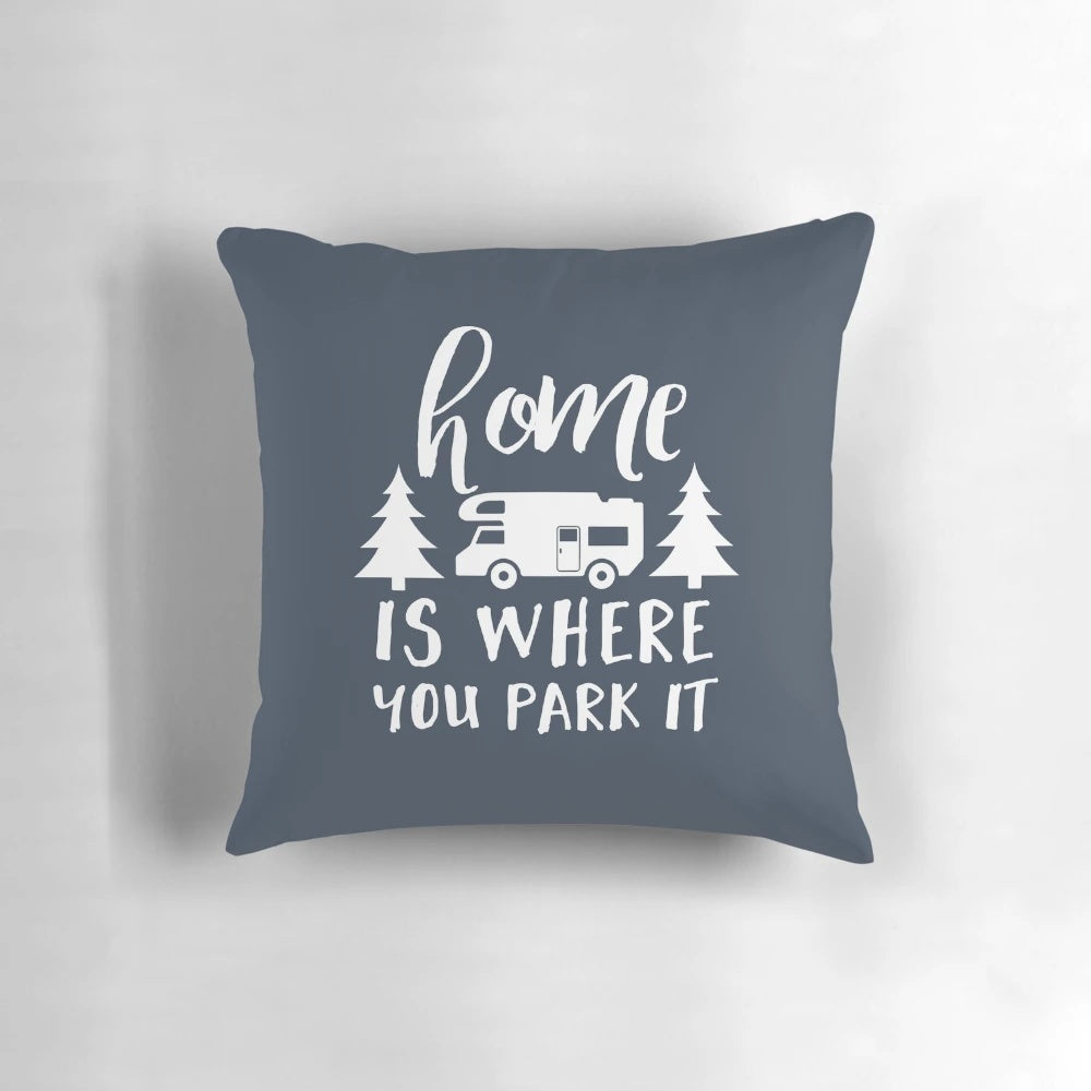 Home Is Where You Park It" throw pillow with camping, RV, and wanderlust design