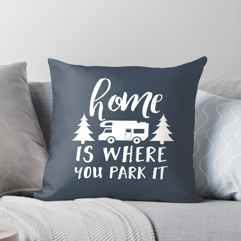 Home Is Where You Park It" throw pillow with camping, RV, and wanderlust design