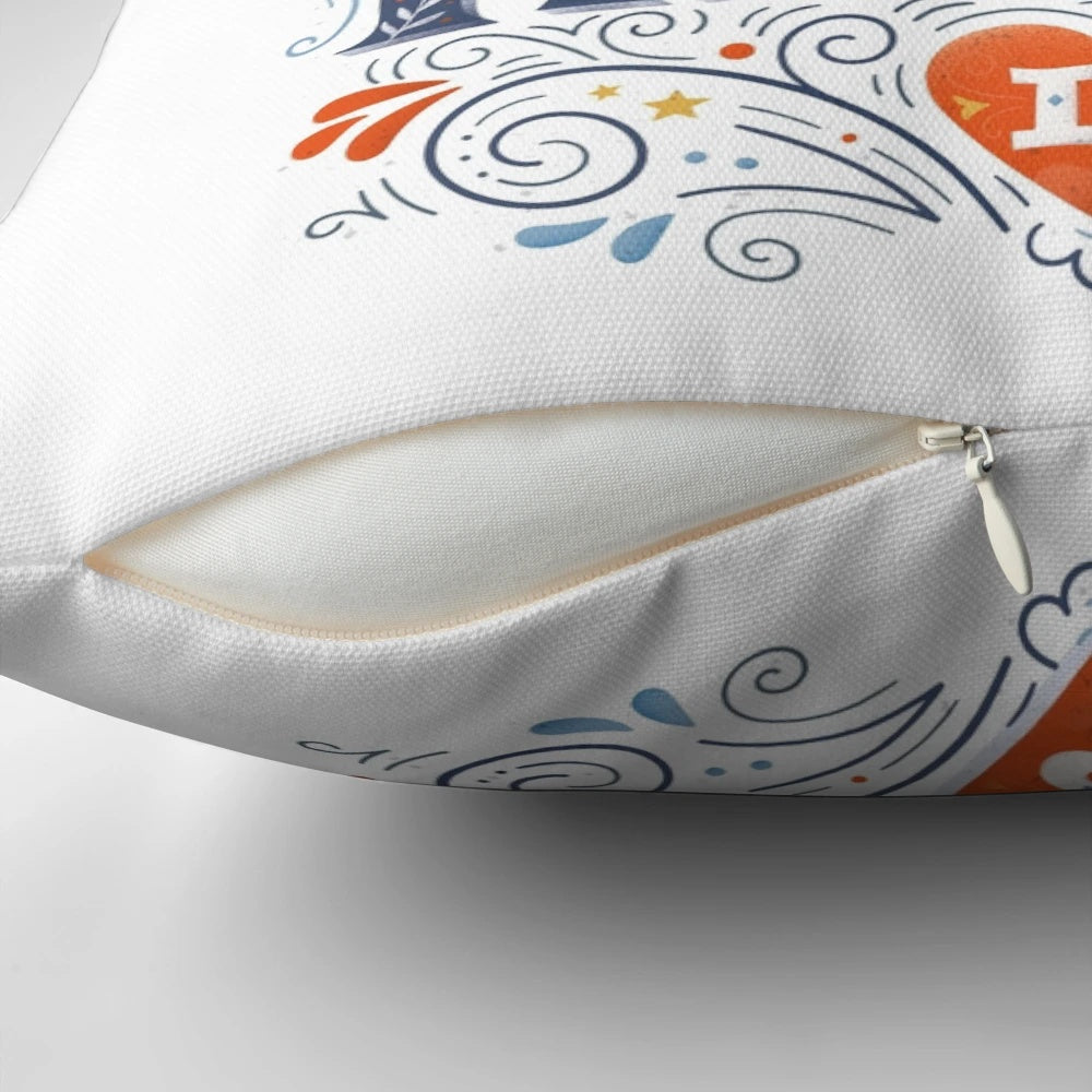 A decorative throw pillow with the inspirational quote "Home is where your heart is" in a handwritten typography design.