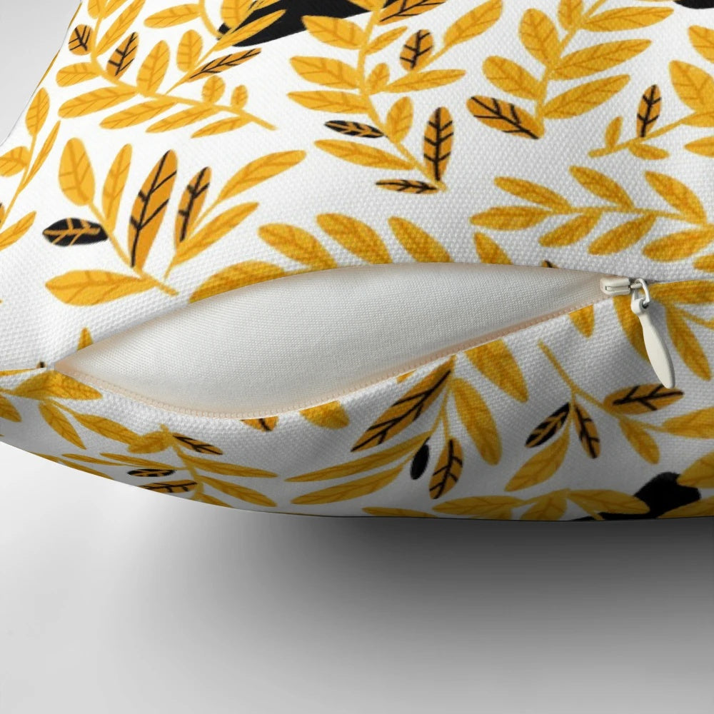 Soft and plush honey-colored pillow with autumn leaves design