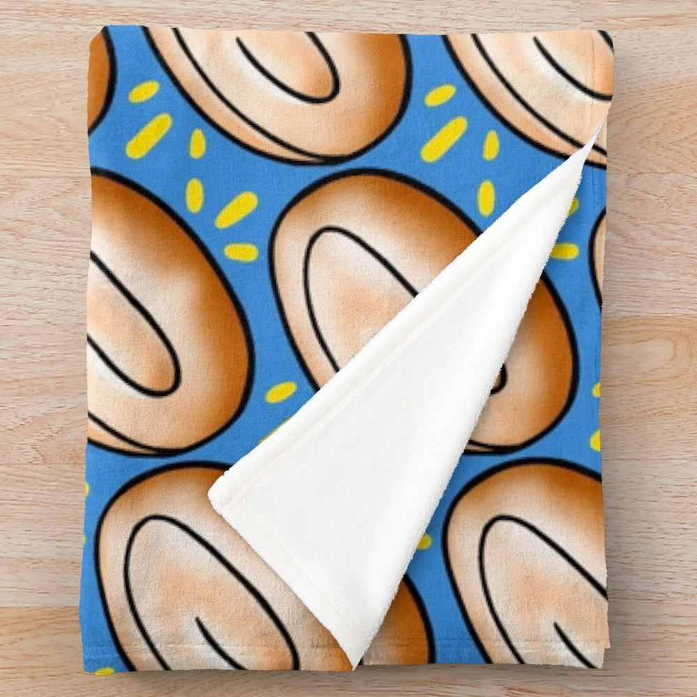 Soft and cuddly honeybun-inspired plush blanket with emote design