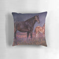 A soft, plush pillow featuring a horse and foal design, perfect for adding a touch of nature to any nursery or home.