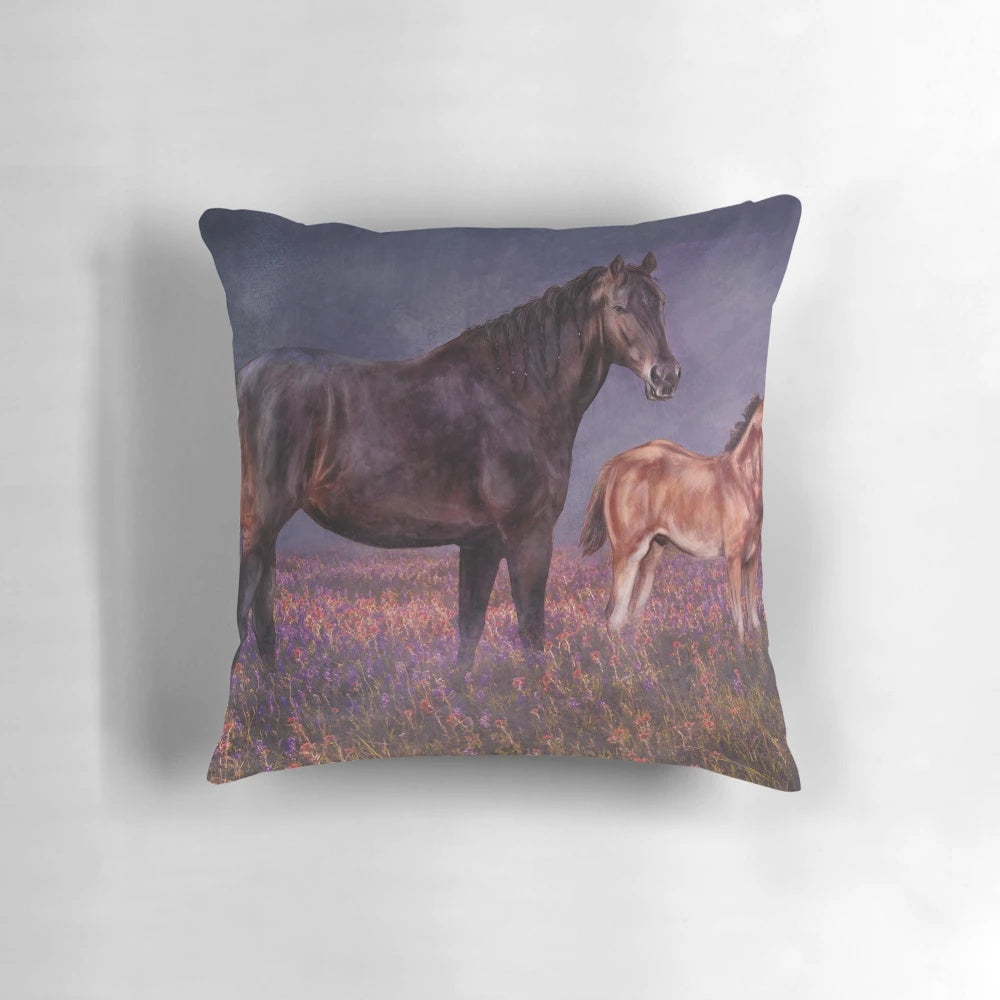 A soft, plush pillow featuring a horse and foal design, perfect for adding a touch of nature to any nursery or home.
