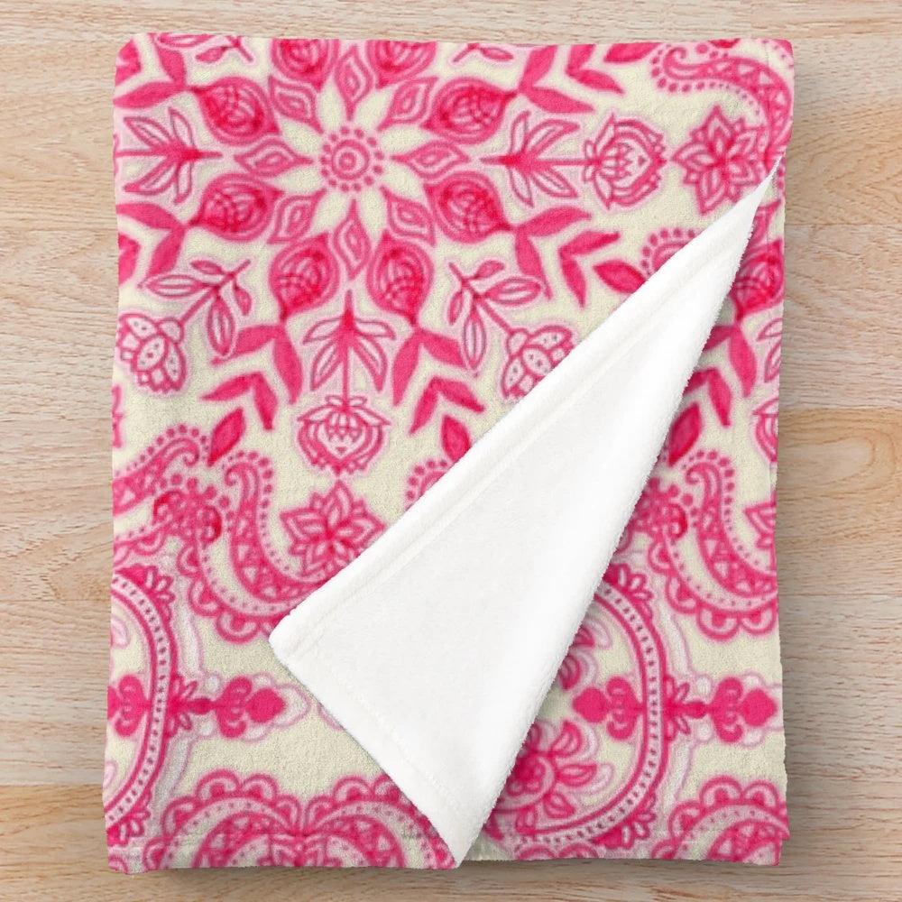 Hot pink and soft cream plush blanket with folk art pattern