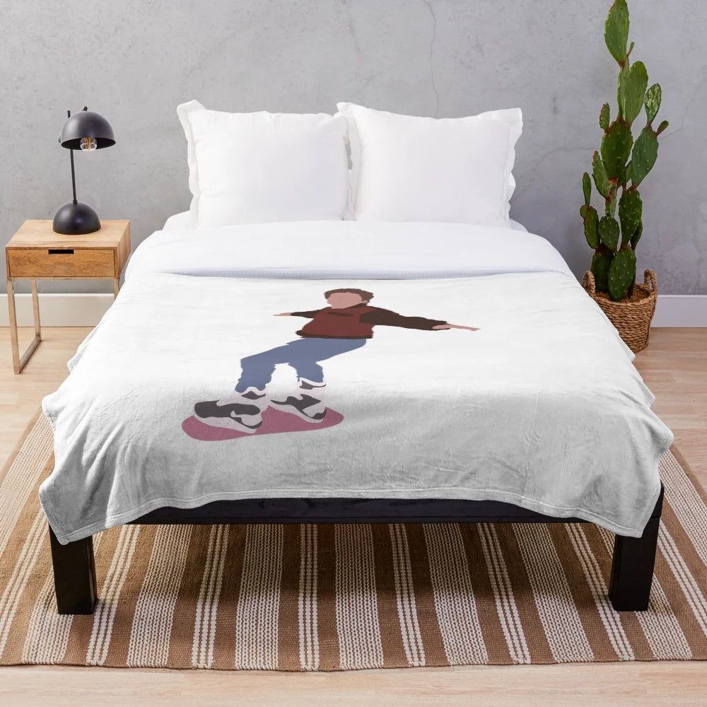 A plush, cozy blanket featuring a hoverboard design, perfect for Back to the Future fans