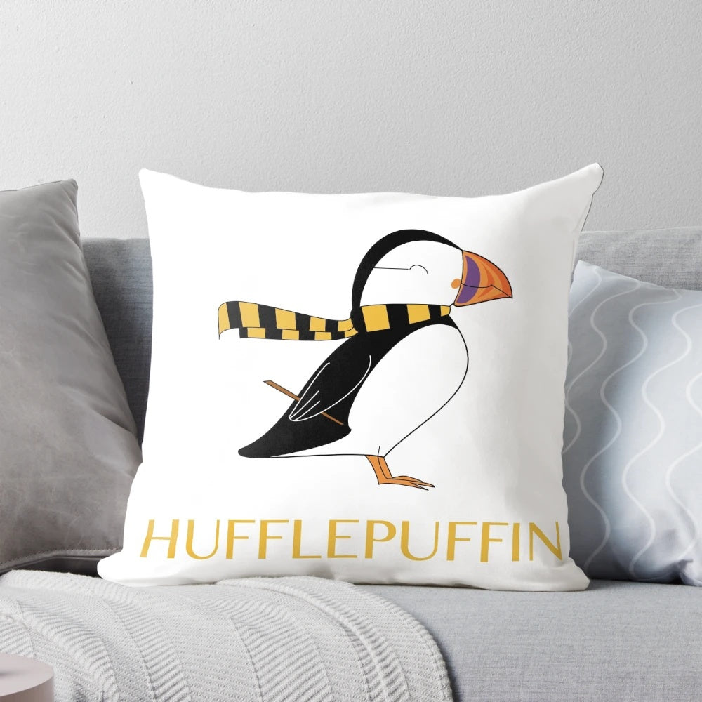 Hufflepuff themed puffin shaped throw pillow in yellow and black colors