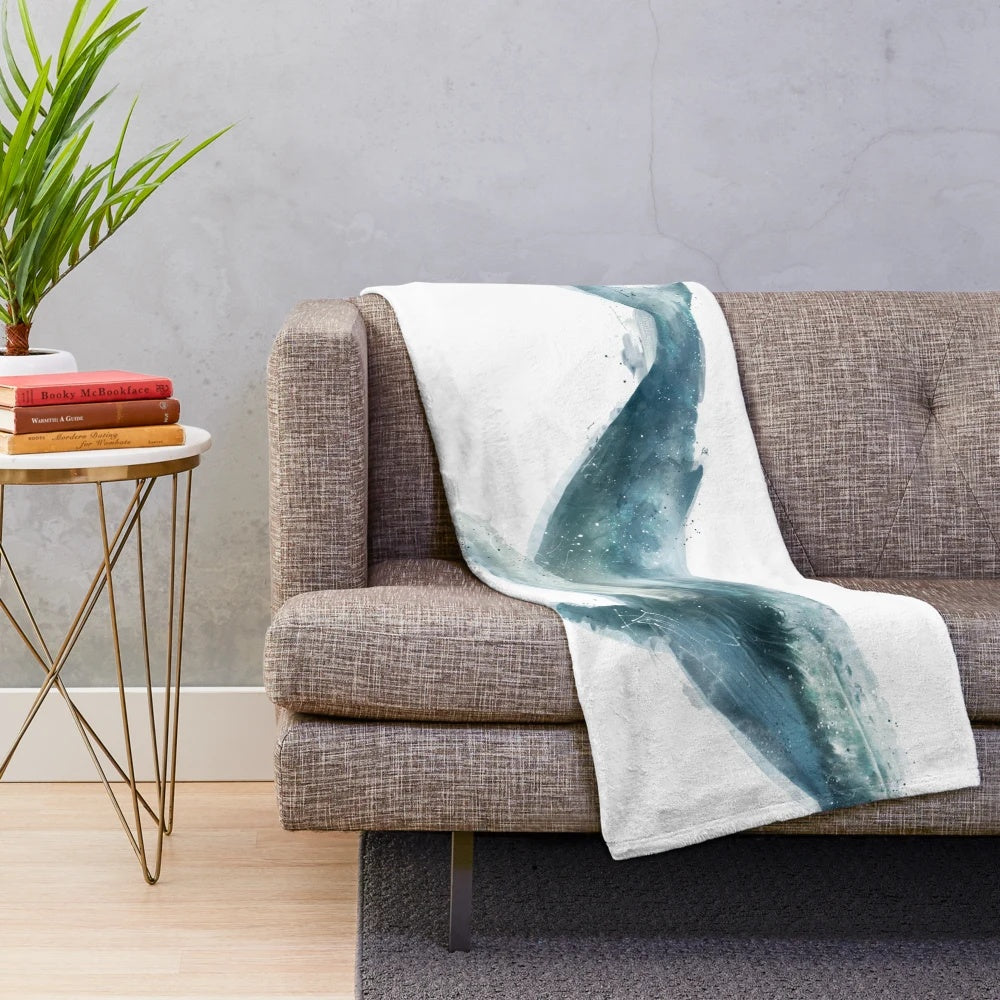 Humpback whale plush blanket providing a cozy and nature-inspired touch to any space