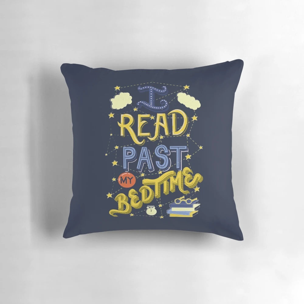 A plush, owl-themed decorative pillow with the text "I Read Past My Bedtime" in a whimsical typographic design.