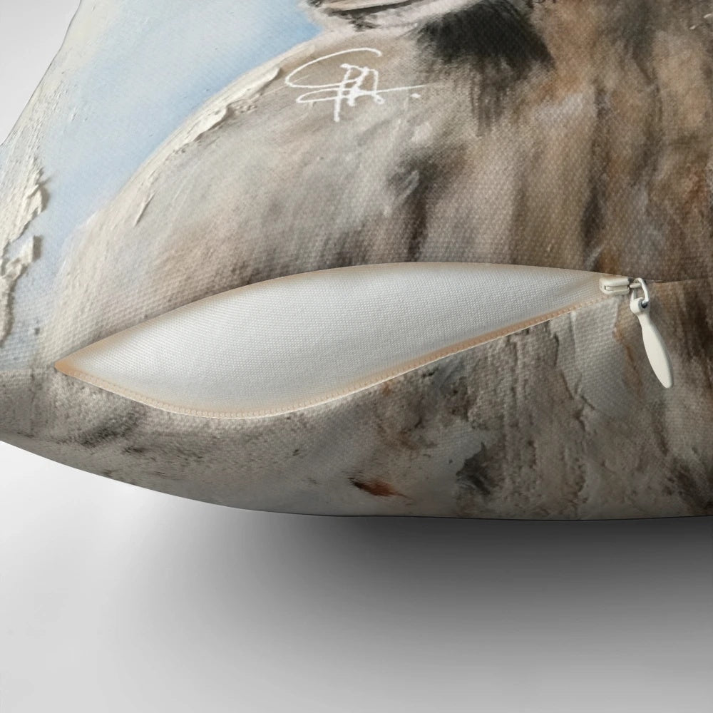 Soft pillow featuring an illustration of an ibex mountain goat with curved horns against a snowy mountain backdrop.