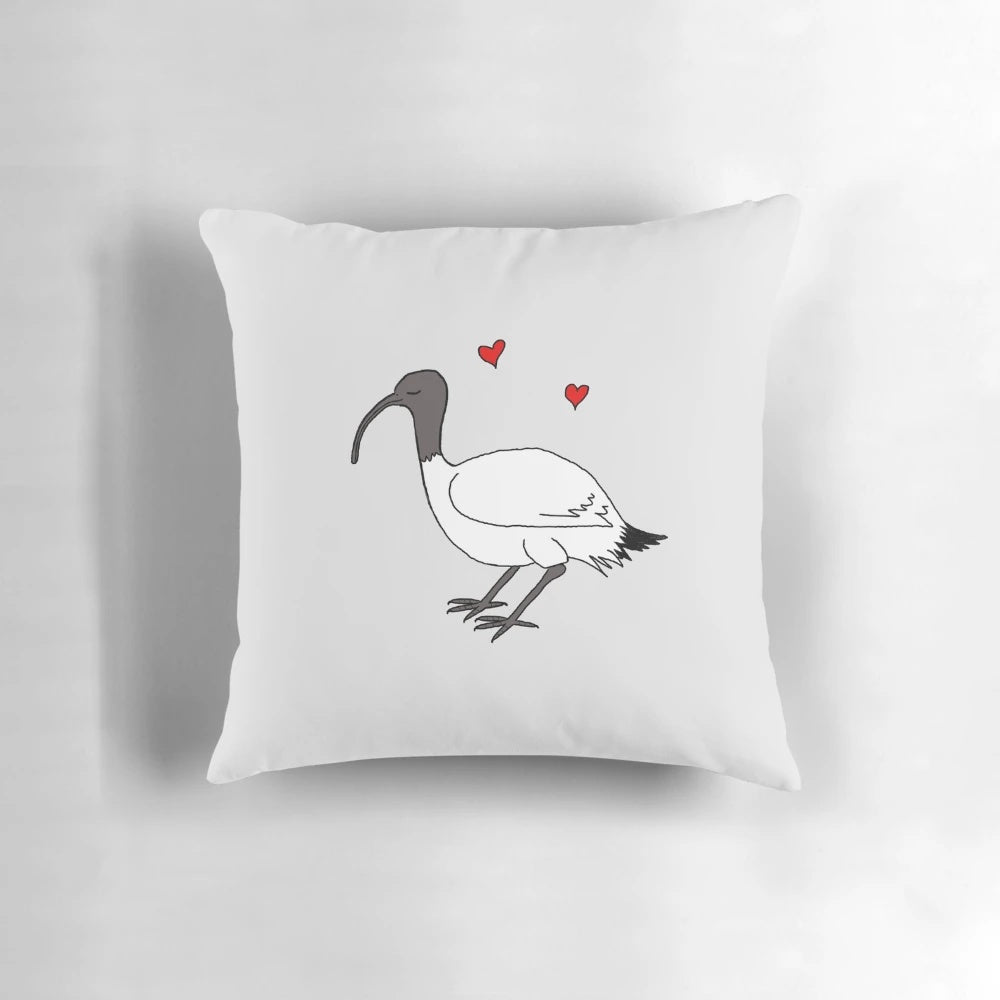 An Ibis-themed pillow featuring the iconic Australian bird, the bin chicken.