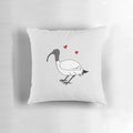 An Ibis-themed pillow featuring the iconic Australian bird, the bin chicken.