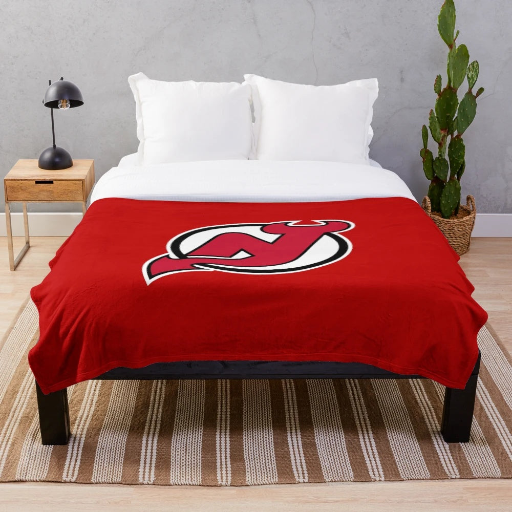 Plush blanket with ice hockey design for sports fans