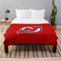 Plush blanket with ice hockey design for sports fans