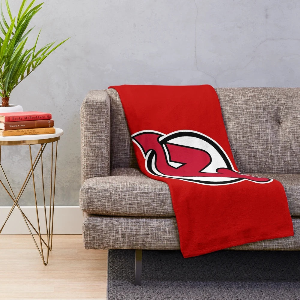 Plush blanket with ice hockey design for sports fans