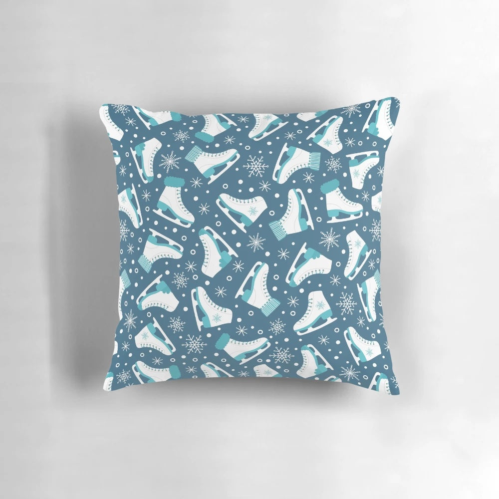 Soft, plush pillow featuring ice skates and snowflakes, ideal for winter sports enthusiasts.