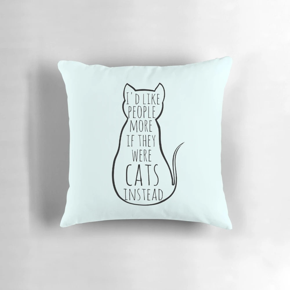 A soft, plush pillow with the text "I'd like people more if they were cats instead" printed on it, appealing to cat lovers and introverted personalities.