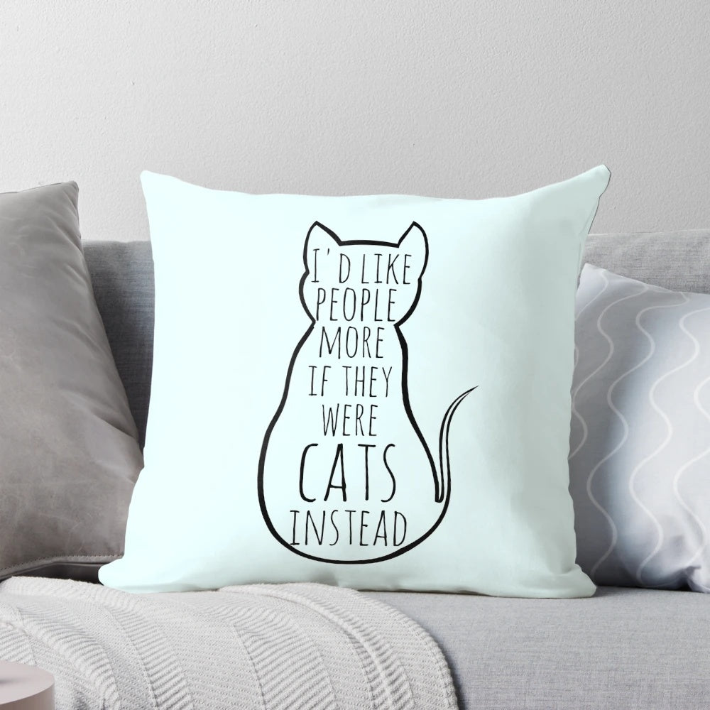 A soft, plush pillow with the text "I'd like people more if they were cats instead" printed on it, appealing to cat lovers and introverted personalities.