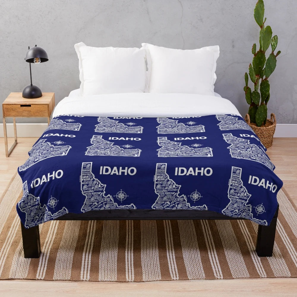 Plush blanket featuring a detailed illustration of the state of Idaho