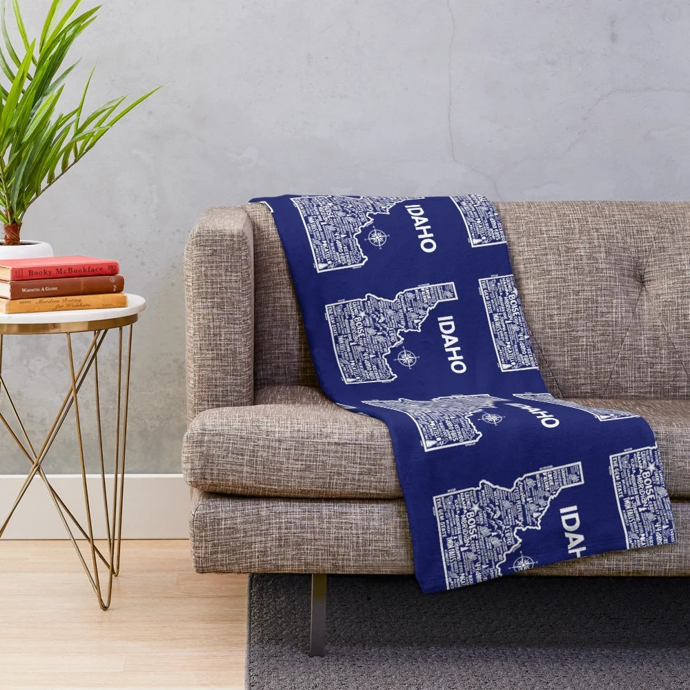 Plush blanket featuring a detailed illustration of the state of Idaho
