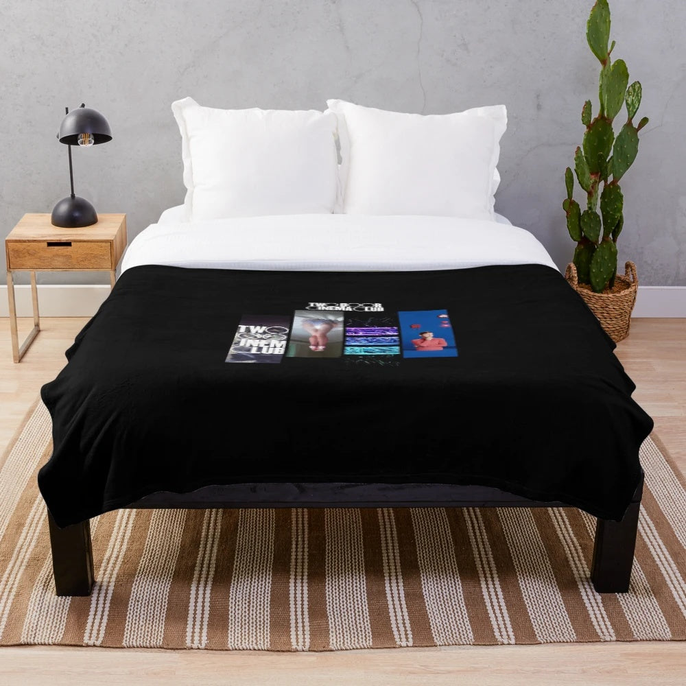 Plush blanket featuring the album covers of Two Door Cinema Club's discography