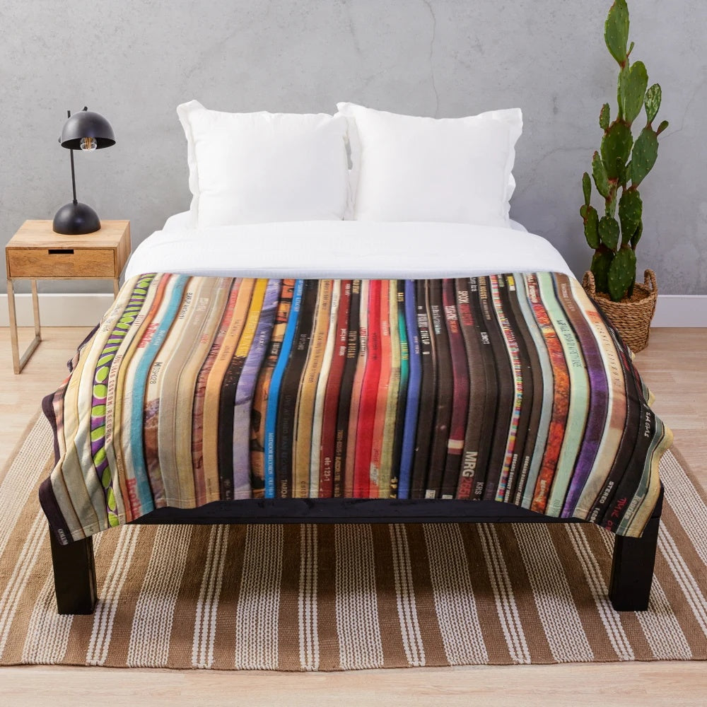 Soft, plush blanket featuring a vintage-inspired design with indie rock vinyl records