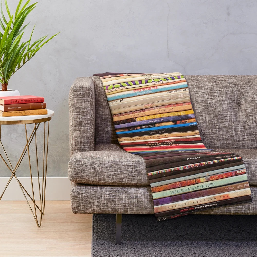 Soft, plush blanket featuring a vintage-inspired design with indie rock vinyl records