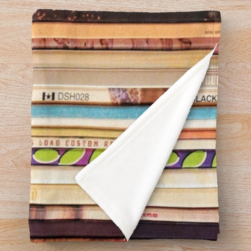Soft, plush blanket featuring a vintage-inspired design with indie rock vinyl records
