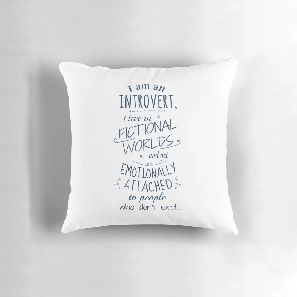 Soft, plush pillow featuring a cozy introvert design with fictional characters and book-themed elements.