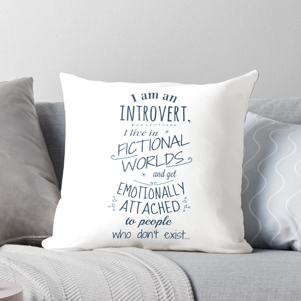Soft, plush pillow featuring a cozy introvert design with fictional characters and book-themed elements.