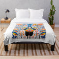 Inuit-inspired plush blanket with intricate tribal patterns