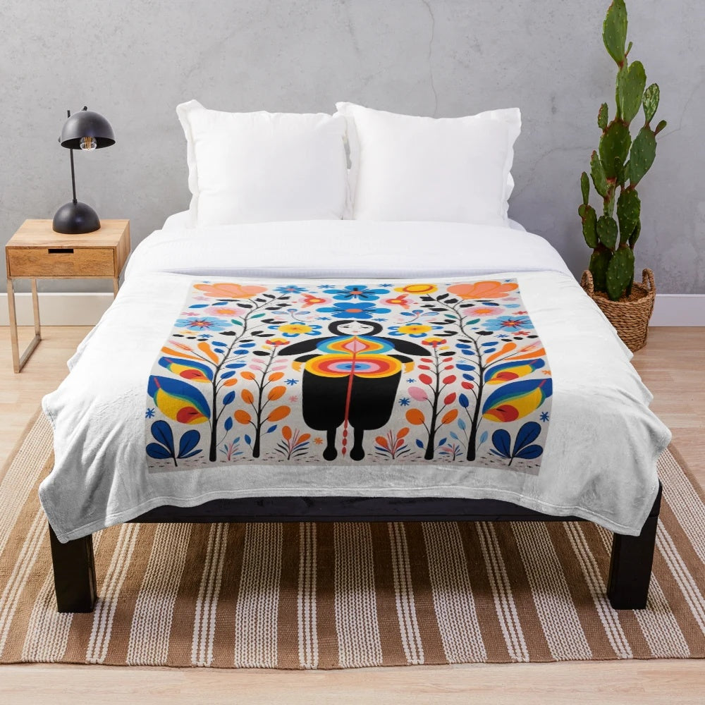 Inuit-inspired plush blanket with intricate tribal patterns