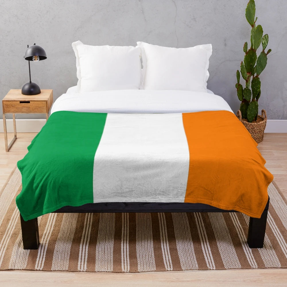 Soft and warm plush blanket featuring the iconic Irish flag design