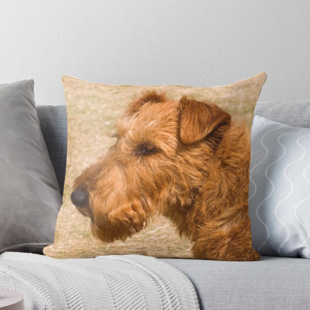An Irish Terrier themed throw pillow with the dog's iconic red coat and friendly expression.